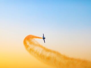 Featured post: Black airplane in the sky